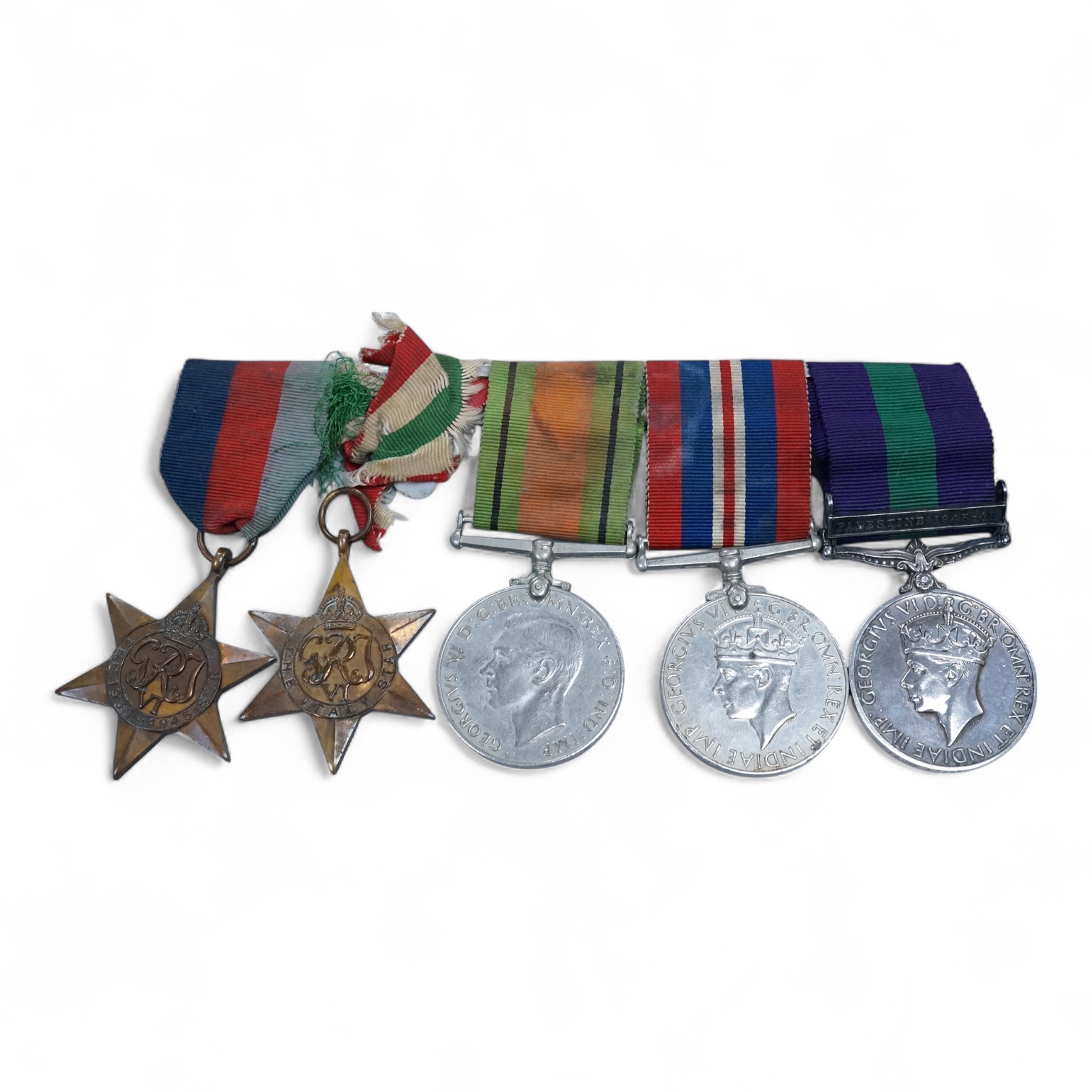 A WWII medal group awarded to Fg. Off. A.J. Fransella R.A.F., comprising of five medals including the Defence Medal, the 1939-1945 Medal, the Italy Star, the 1939-1945 Star and the General Service Medal with clasp for Pa